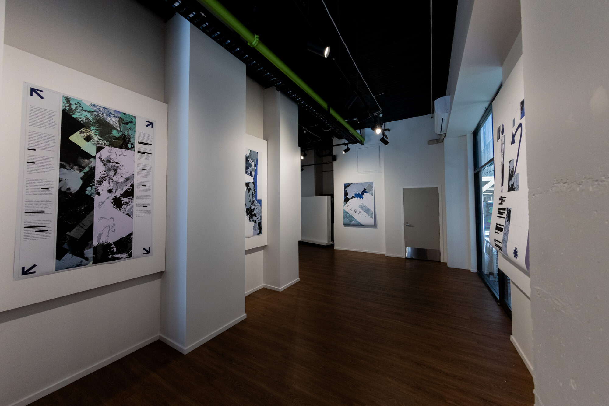 The prints running the length of the corridor, receding into the room