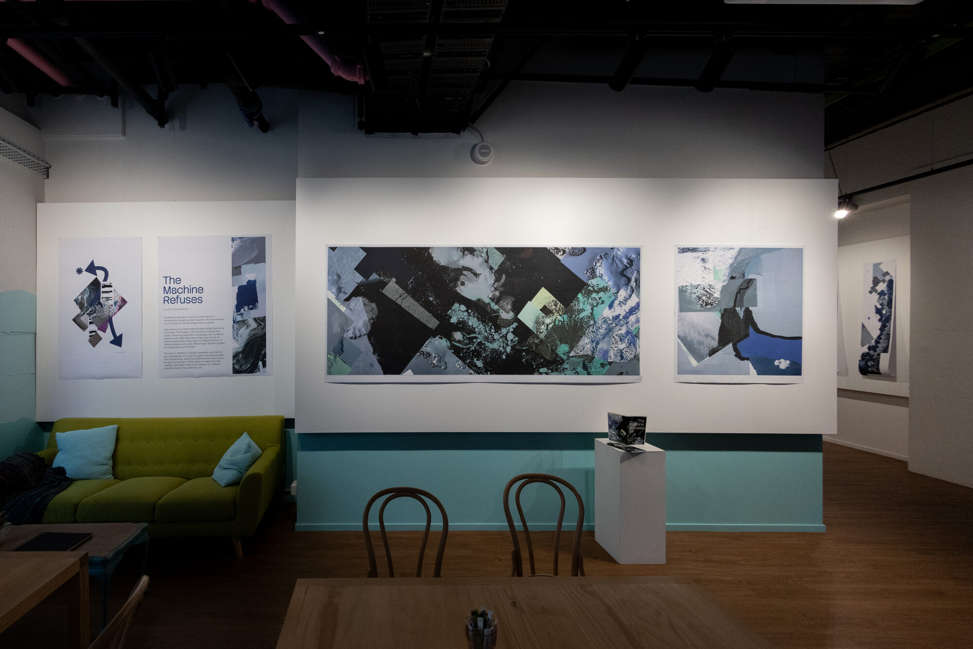 The main wall in full — title texts, panorama plate, and the plinth