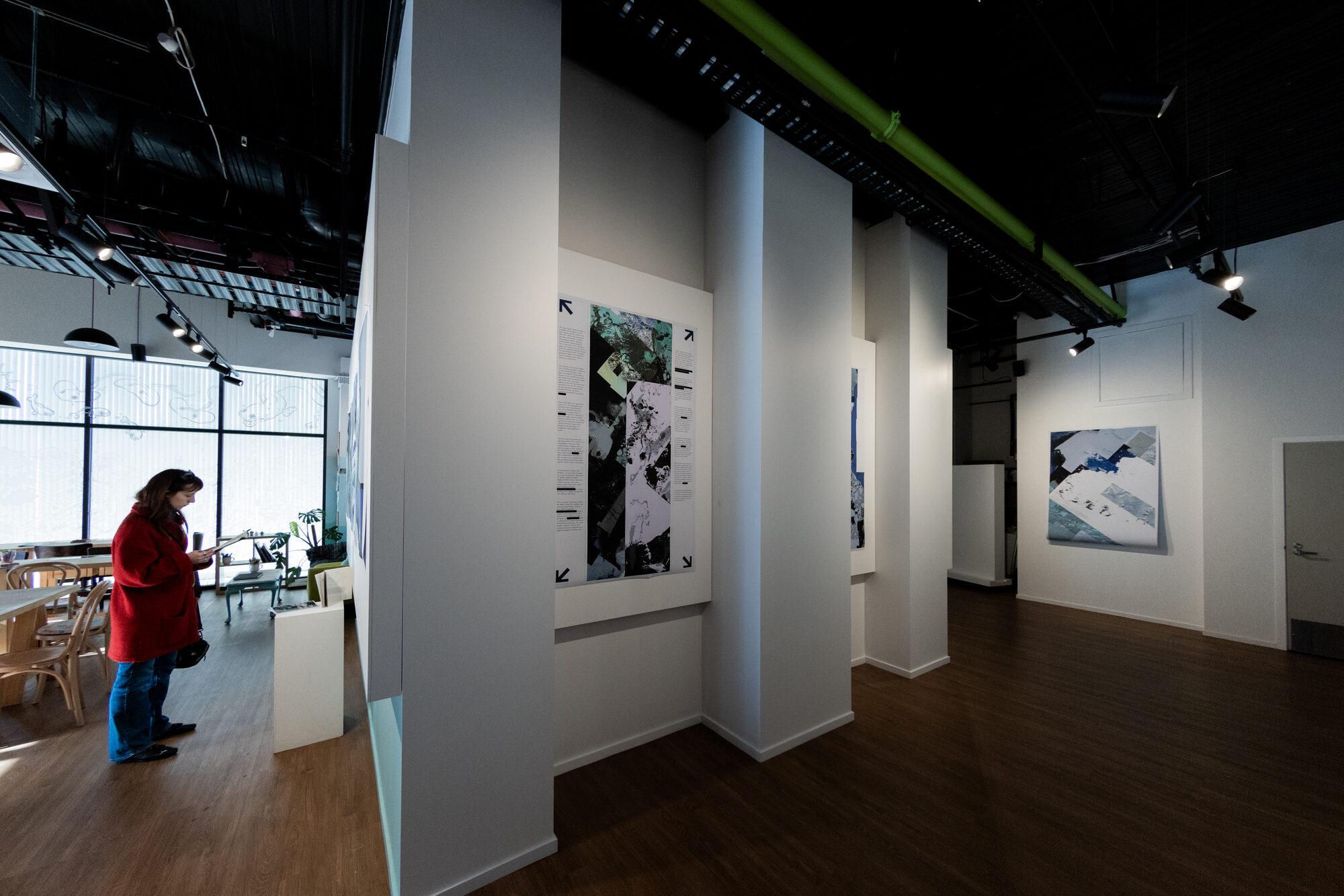A visitor reading in the installed space